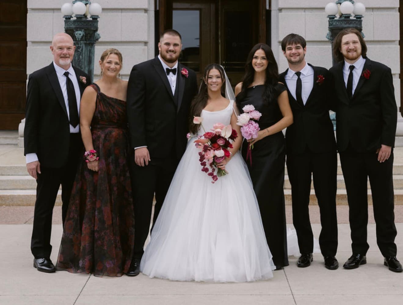 Dr. Erik Petersen with his wife and their grown children at a family wedding